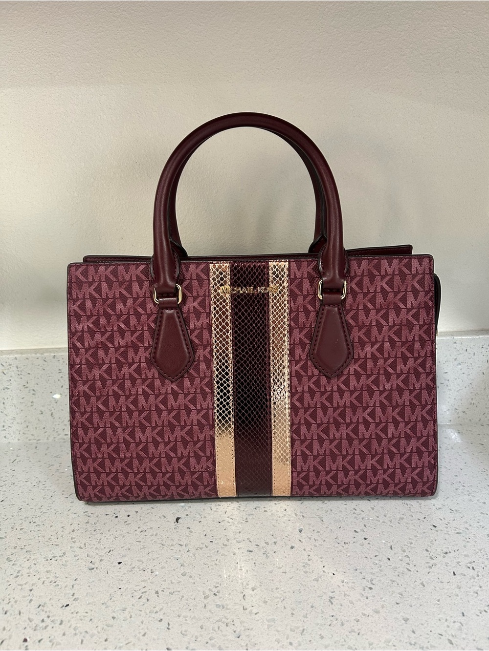 Michael Kors Burgundy Monogram Satchel with Metallic Rose Stripe